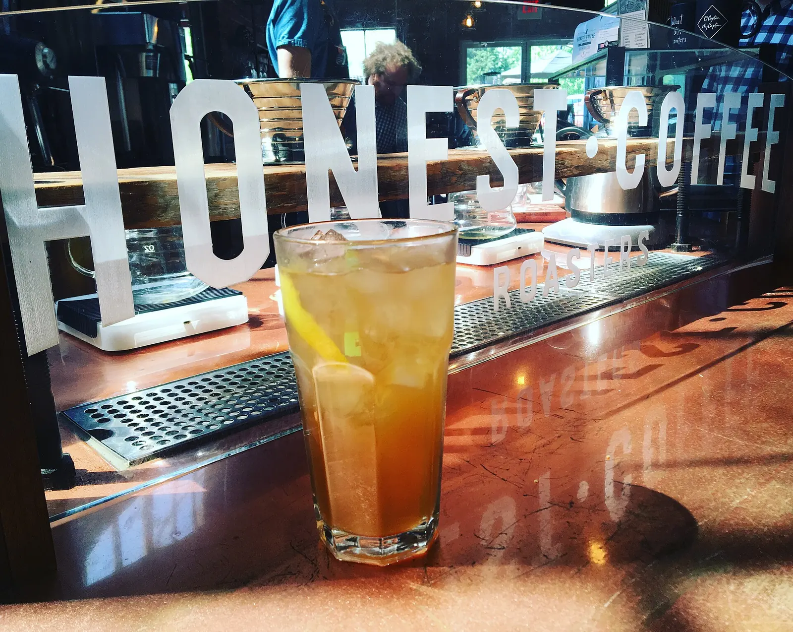 A glass of iced tea on the counter of a coffee bar in Franklin, a few miles south of Brentwood