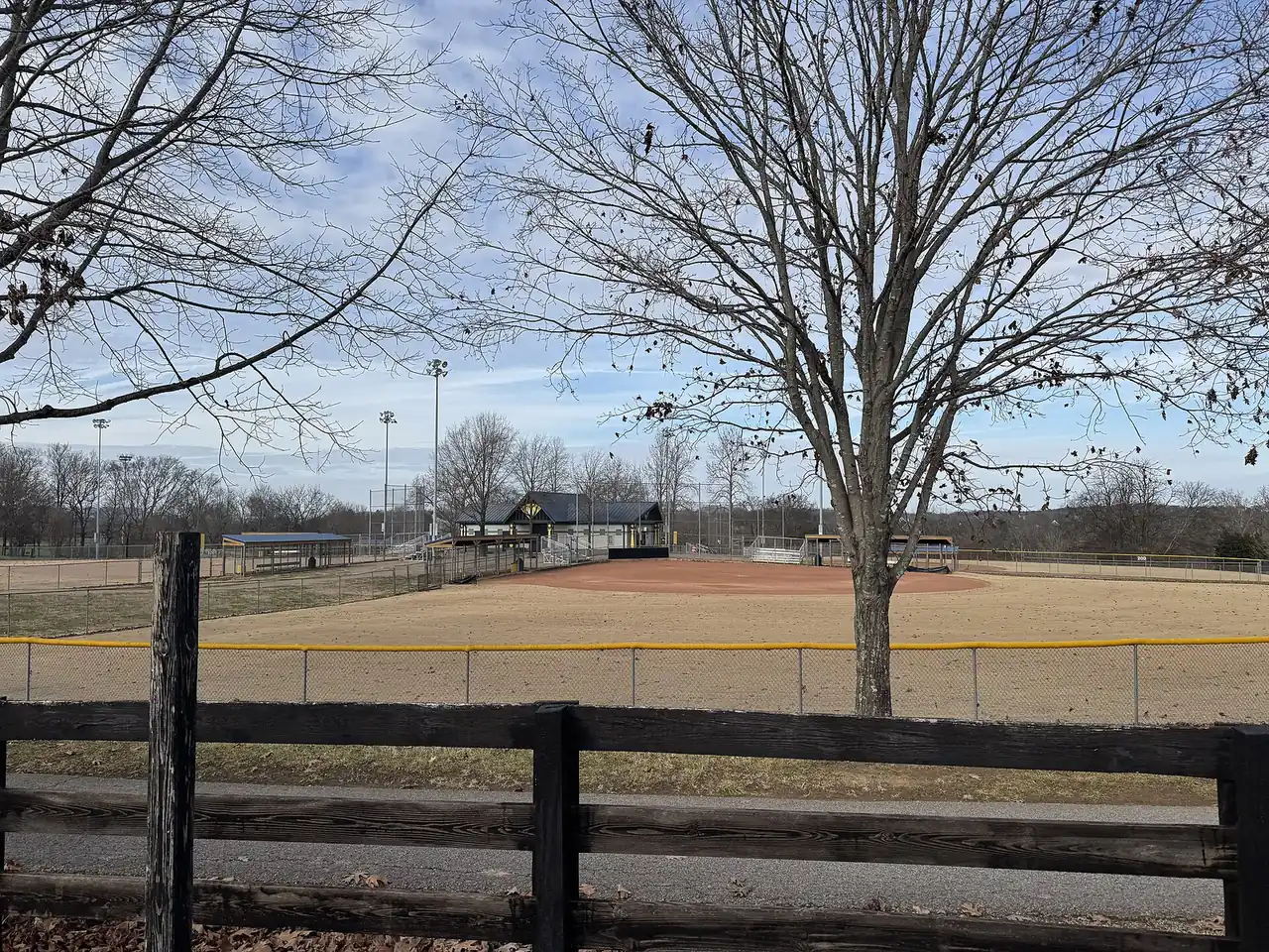 The softball and baseball diamonds at Crockett Park in Brentwood, seen across a split-rail fence