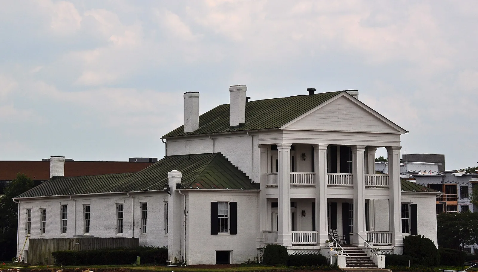 Mooreland, the columned historic house off Franklin Road (U.S. 31) in Brentwood, with office buildings behind it