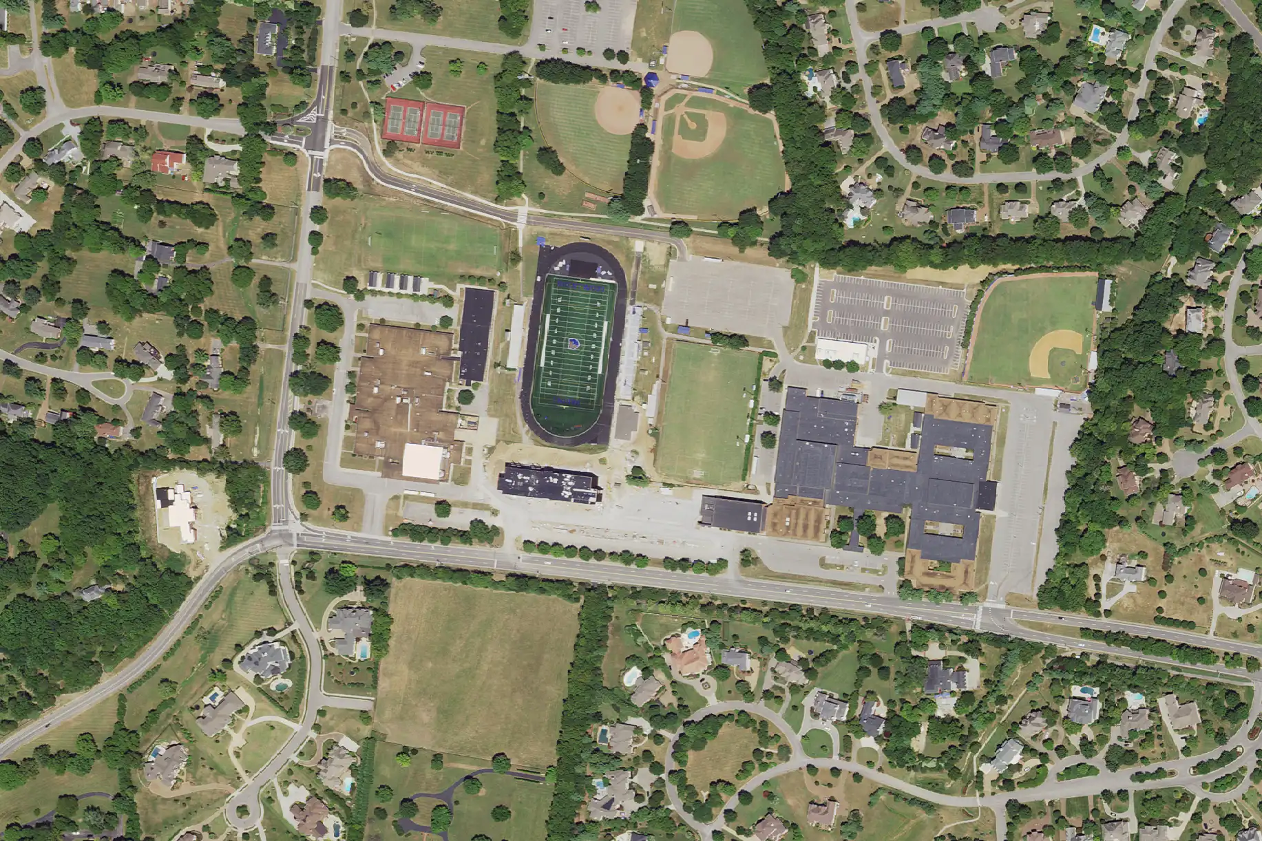 Brentwood Middle School, left, and Brentwood High School, right, with a football stadium between them on Murray Lane in Brentwood, seen from the air in 2018