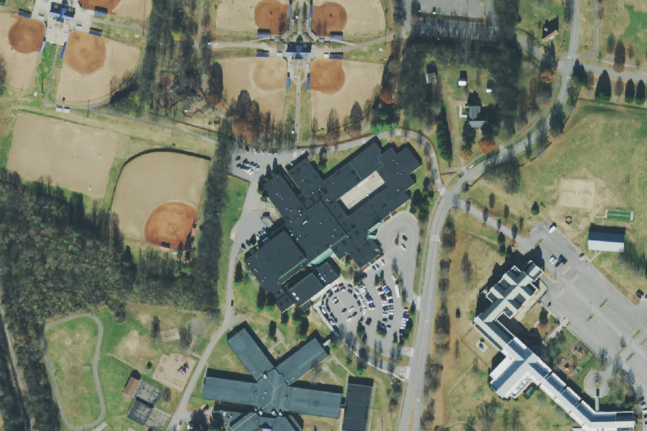Woodland Middle School on Volunteer Parkway in Brentwood, with Crockett Elementary at the bottom of the frame, seen from the air in 2021