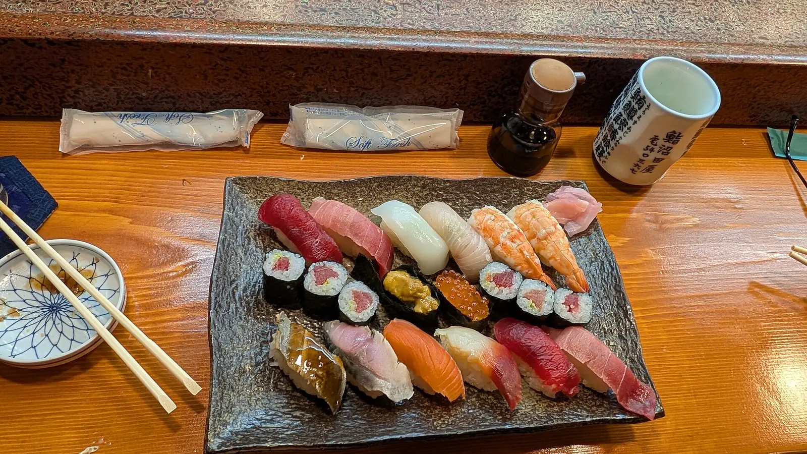 A platter of nigiri sushi on a restaurant counter in Nikko, Japan.